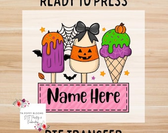 May include: A Halloween-themed DTF transfer design featuring three ice cream treats: a purple popsicle, a candy corn-shaped treat, and an ice cream cone. The design includes the text "Ready to Press", "Name Here", and "DTF Transfer".