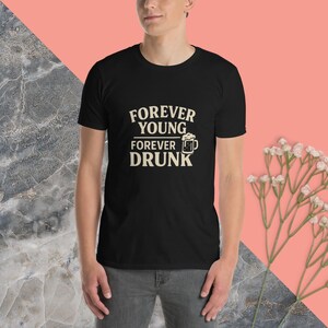 May include: Black t-shirt with the text "FOREVER YOUNG FOREVER DRUNK" and a beer mug graphic.
