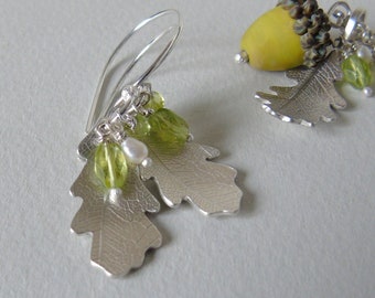 Silver oak leaf and green peridot earrings