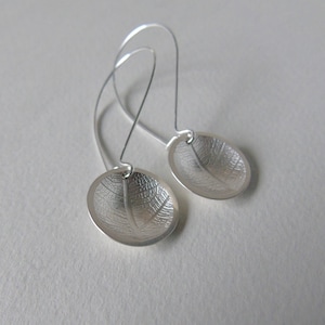 Silver leaf domed earrings image 1