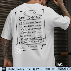 May include: A white t-shirt featuring a black graphic on the back. The graphic is a notepad titled DAD'S TO-DO LIST with checked items: Fix the leaky faucet, Drive kids to practice, Help with homework, Mow the lawn, Be there, Love unconditionally, and Pray it all works out, with the text Philippians 4:6 at the bottom.