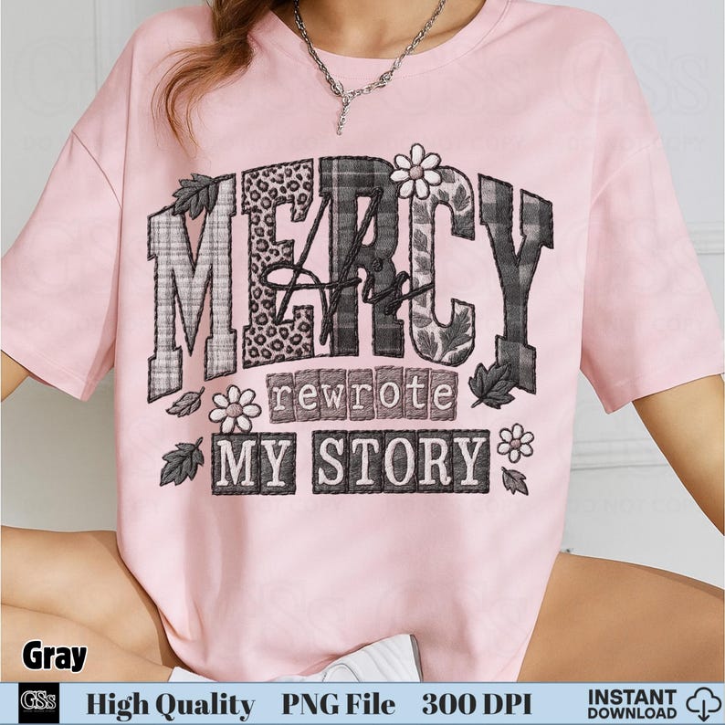 Pink t-shirt mockup with grayscale embroidery style “Mercy His Rewrote My Story” design