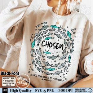May include: Cream-colored sweatshirt with a circular design of fish in shades of gray and teal surrounding the word "CHOSEN." The text "BE NOT CONFORMED TO THIS WORLD (ROMANS 12:2)" is also visible.