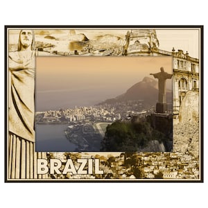 May include: A wooden picture frame featuring a sepia-toned image of Brazil. The frame includes illustrations of Christ the Redeemer, cityscapes, and the word "BRAZIL" at the bottom. The central image shows a coastal city with mountains.