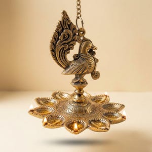 Gold Potli Packed with Metal Gold Oxide Mor Diya Hanging | Diwali  Gift