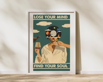 May include: A framed art print with the text "LOSE YOUR MIND FIND YOUR SOUL". The artwork features a woman in a white shirt with a vinyl record design in place of her head. A glass of wine and a bottle are also in the image.