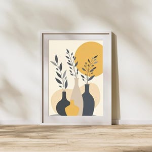 May include: Framed art print featuring an abstract illustration of vases with leafy stems. The color palette includes shades of yellow, gray, and black against a cream background. The artwork is displayed in a white frame, suitable for home decor.