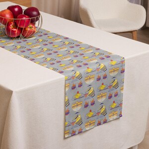 Playful Hanukkah Table Runner: Dreidels, Menorahs, Olive Jars