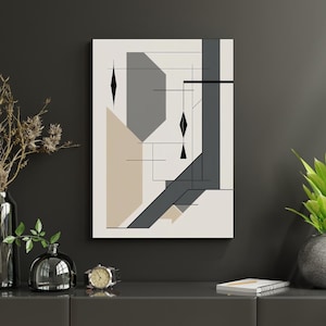 Könnte beinhalten: Abstrakter geometrischer Kunstdruck mit Formen in Grau-, Beige- und Schwarztönen auf weißem Hintergrund. Das Kunstwerk enthält Diamantenformen und lineare Elemente und schafft eine moderne, minimalistische Ästhetik. Der Druck wird an einer dunkelgrauen Wand angezeigt.