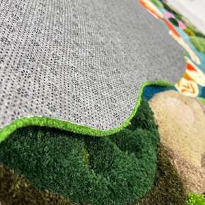Oversized hand tufted koi pond area rug with layered 3D texture, inspired by Japanese garden and nature
