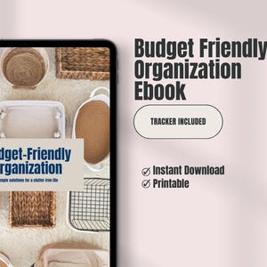 May include: A digital tablet shows an ebook titled "Budget Friendly Organization." The cover displays storage baskets and the text "Tracker Included." The ebook is an instant download and printable.