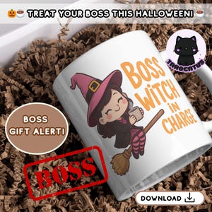 May include: White ceramic mug with a cartoon witch design. The witch wears a pink hat and holds a mug, with the text "Boss Witch in Charge." Additional text includes "Boss Gift Alert!" and "Treat Your Boss This Halloween!"