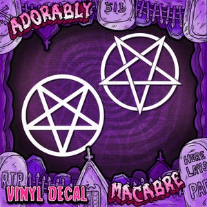 May include: Two white pentagram vinyl decals on a dark purple background. The word "ADORABLY" is at the top, and "VINYL DECAL" and "MACABRE" are at the bottom. The image has a graveyard theme with tombstones and a church.