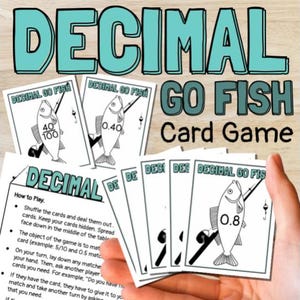 May include: A stack of "Decimal Go Fish" card game cards. The cards feature a fish illustration with decimal numbers. The game's title is in large teal letters. Instructions are visible on a separate card.