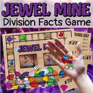 May include: A board game called "JEWEL MINE Division Facts Game" with colourful gems and game pieces. The game board has a mine theme with the word "MINE" repeated. A hand holds several colourful gems. The game includes a "POWER KEY" with maths problems.
