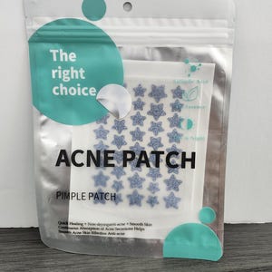 May include: A clear plastic pouch containing acne patches. The package has a teal and white design with the words "The right choice" and "ACNE PATCH". The patches are star-shaped and glittery. The package also says "Pimple Patch".
