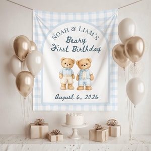 May include: A party banner with a blue and white gingham border, featuring the text "Noah & Liam's Beary First Birthday" and two teddy bear illustrations. The date "August 6, 2026" is displayed. Balloons, gifts, and a cake are also present.