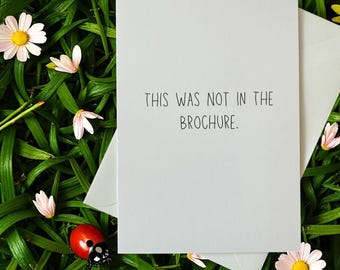 This Was Not In The Brochure – Funny Greeting Card