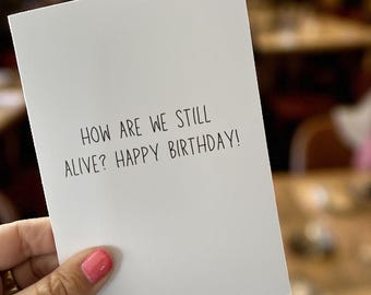 How Are We Still Alive? Happy Birthday - Funny Birthday Card