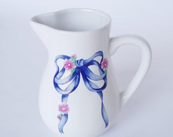 Vintage Ceramic Pitcher with Blue Ribbon & Floral Design