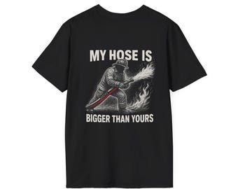May include: Black t-shirt with a graphic of a firefighter holding a hose and the text "MY HOSE IS BIGGER THAN YOURS".