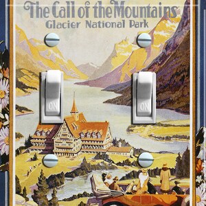 May include: A vintage-style light switch plate featuring a colorful illustration of a mountain lake, a lodge, and a car with people in it. The text "The Call of the Mountains Glacier National Park" is at the top of the image.