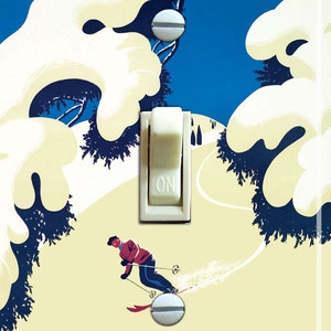 May include: A light switch cover featuring a vintage illustration of a skier in a snowy mountain landscape. The text "Truckee" is printed in red below the skier. The switch is white with the word "ON" printed on it.