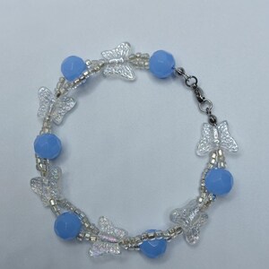 Bracelet papillon en perles de verre