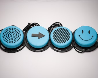 Kit d&#39;interrupteurs tactiles adaptés aux interrupteurs – Lot de 4 (point, ligne, flèche et smiley)