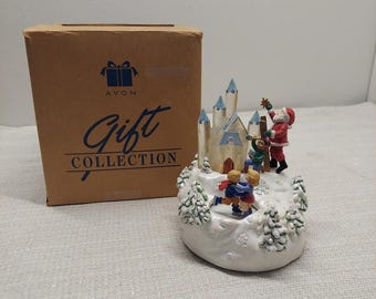 Avon 1997 Santa's Magical Castle Musical Light Up Animated Christmas Figurine