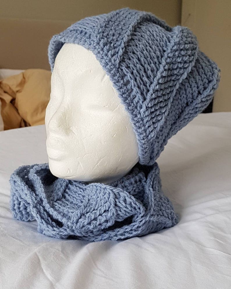 Blue cork-screw patterned matching beanie hat and looped scarf set hand crocheted