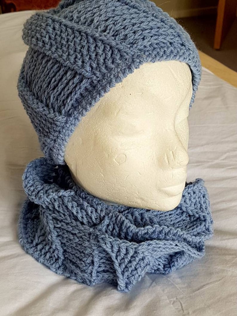 Blue cork-screw patterned matching beanie hat and looped scarf set hand crocheted