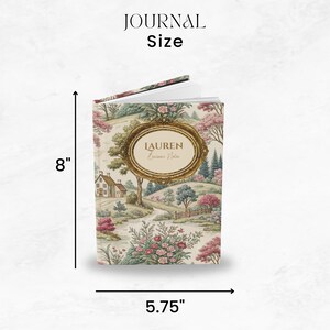 May include: A personalized journal with a landscape design. The journal is 8 inches tall and 5.75 inches wide. The cover features a gold-framed oval with the name "LAUREN" and the words "Business Notes". The journal's cover has a floral and landscape pattern.