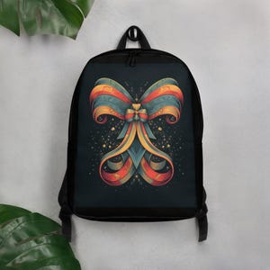 Elegant Red and Gold Bow Print Backpack, Trendy Ribbon Design Water-Resistant Bag with Laptop Pocket for School and Everyday Use