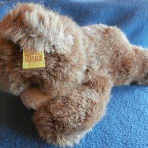 Steiff Teddy, floppy Teddy, lying, w.button/flag/tag, made in Germany  98