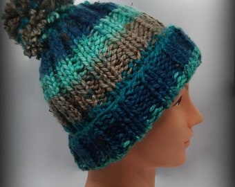 HAND KNIT HAT - Turquoise, tan pom-pom