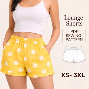 Puede incluir: Pantalones cortos de salón amarillos con estampado de margaritas blancas, cintura elástica y bolsillos. La imagen también incluye una camiseta sin mangas blanca y el texto "Lounge Shorts" y "PDF Sewing Pattern". Tallas XS-3XL.