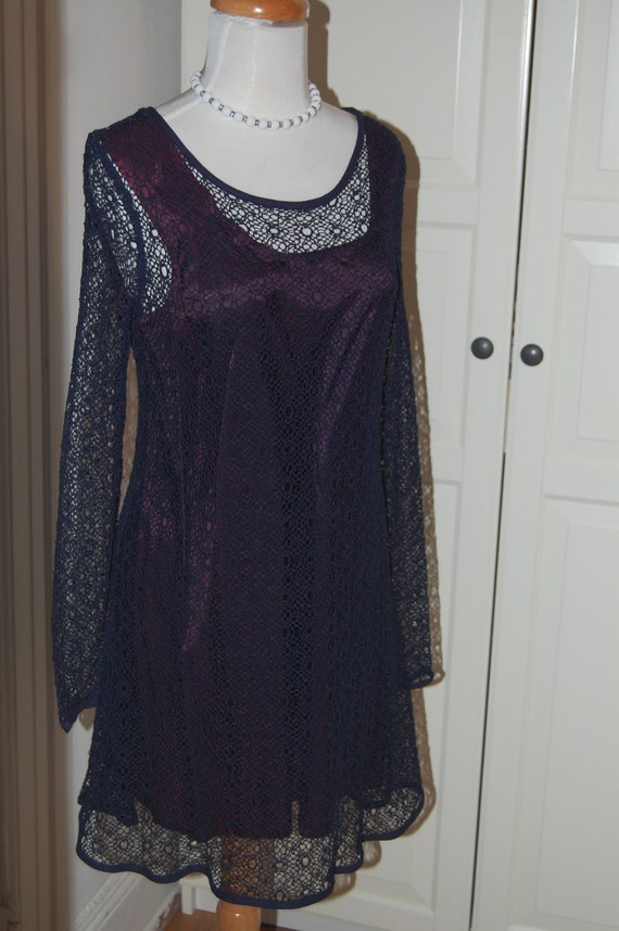 purple and black dress illusion