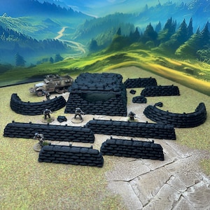 May include: Miniature military terrain set featuring a bunker, sandbag walls, and a military vehicle. The set is painted in shades of black and gray, with miniature soldiers positioned around the structures. The background depicts a landscape.