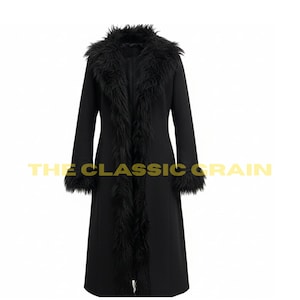 May include: A long black coat with faux fur trim around the collar, down the front, and at the cuffs. The coat has a classic design and features the text "THE CLASSIC GRAIN" in yellow.
