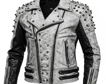 Può includere: Giacca in pelle bianca e nera invecchiata con borchie e cerniere in metallo argentato. La giacca presenta un classico stile biker con colletto a revers, chiusura asimmetrica con zip e maniche in pelle nera.