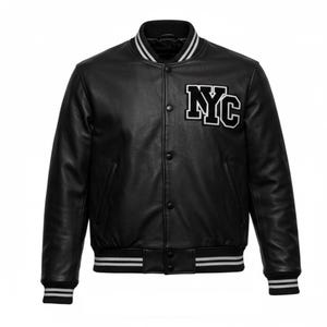 May include: Black leather varsity jacket with the letters "NYC" in white and black on the chest. The jacket has a ribbed collar, cuffs, and hem with white stripes. It features a button-up front and two side pockets.