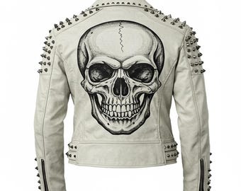 May include: Off-white leather jacket featuring a large black and white skull graphic on the back. The jacket has silver-toned metal spikes on the shoulders and around the collar, with zippers on the sleeves.