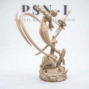 May include: A beige figurine of a character in a dynamic pose, holding a sword and a weapon with a curved blade. The figure is standing on a detailed base. The text "PSN-I DIGITAL SCULPTURE STUDIO" is visible in the background.