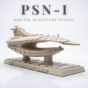 May include: A beige Interdictor Class Cruiser model from Star Wars, displayed on a rectangular base. The model has intricate details and is labeled with the text "PSN-1 DIGITAL SCULPTURE STUDIO". The base reads "STAR WARS INTERDICTOR CLASS CRUISER".