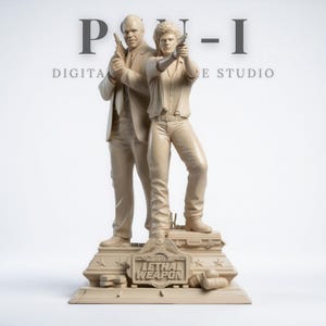 May include: A beige statue depicting two men with guns, in a dynamic pose. The base features the words "LETHAL WEAPON" and an eagle emblem. The studio's name is visible in the background. The statue is a detailed representation.