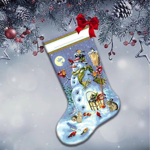 Cross stitch pattern for a Christmas stocking with a snowman, bunnies and birds