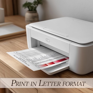 May include: A white printer printing a color chart on a sheet of paper. The paper displays a color palette with various shades of red. The text "PRINT IN LETTER FORMAT" is at the bottom of the image.