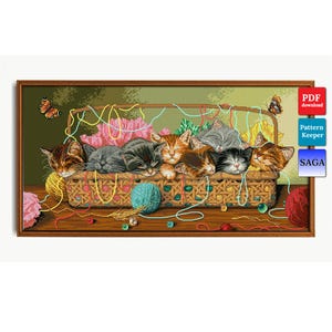 May include: A cross-stitch design featuring seven sleeping kittens nestled in a woven basket. The kittens have various fur colors, including gray, orange, and black. Colorful yarn and a butterfly are also present. The image includes the text "PDF download", "Pattern Keeper", and "SAGA".