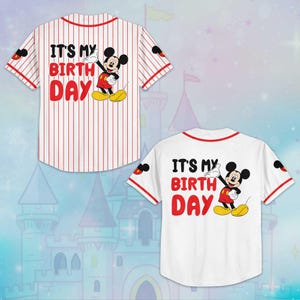 May include: Two white baseball jerseys with red accents and the text "IT'S MY BIRTH DAY" and a Mickey Mouse graphic. One jersey has red pinstripes, the other is solid white. Both have Mickey Mouse graphics on the sleeves.